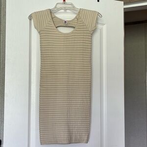 Cream colored backless mid thigh body con dress